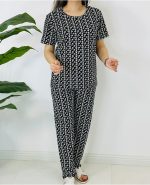 ست تیشرت شلوار پنبه سوپر طرح گل برگ سفید زمینه مشکی8943